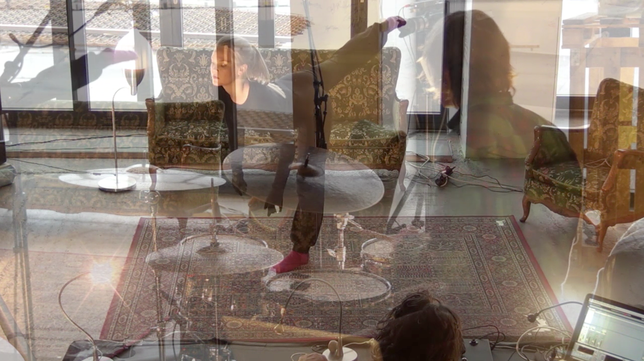 Performing with guitar, drums, electronics and a dancer with sensors